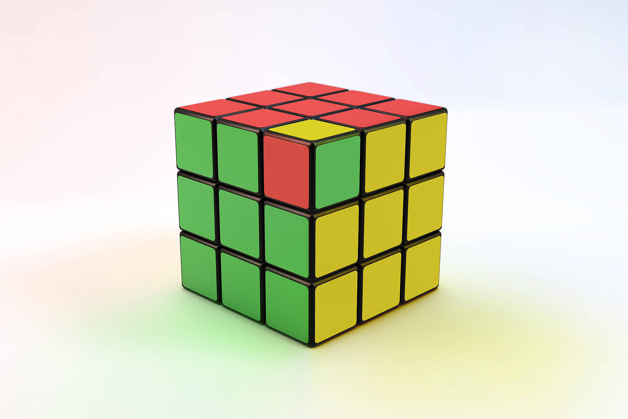 Zauberwürfel beziehungsweise Rubik's Cube in den Farben der Ampelkoalition Rot, Grün und Gelb.